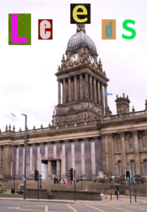 Leeds town hall with the word 'Leeds' spelt out in brightly coloured letters